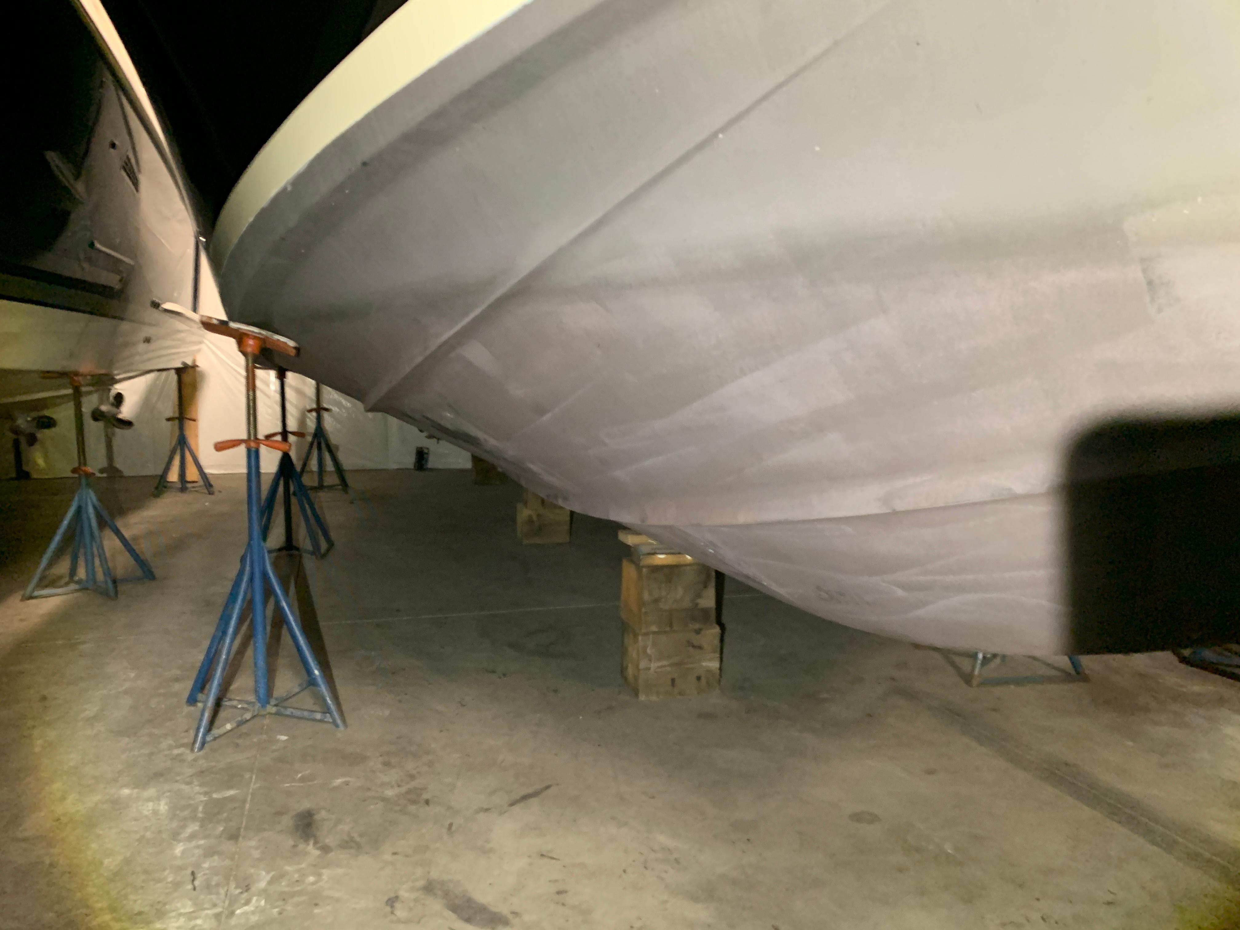 Clean bottom paint, starboard bow