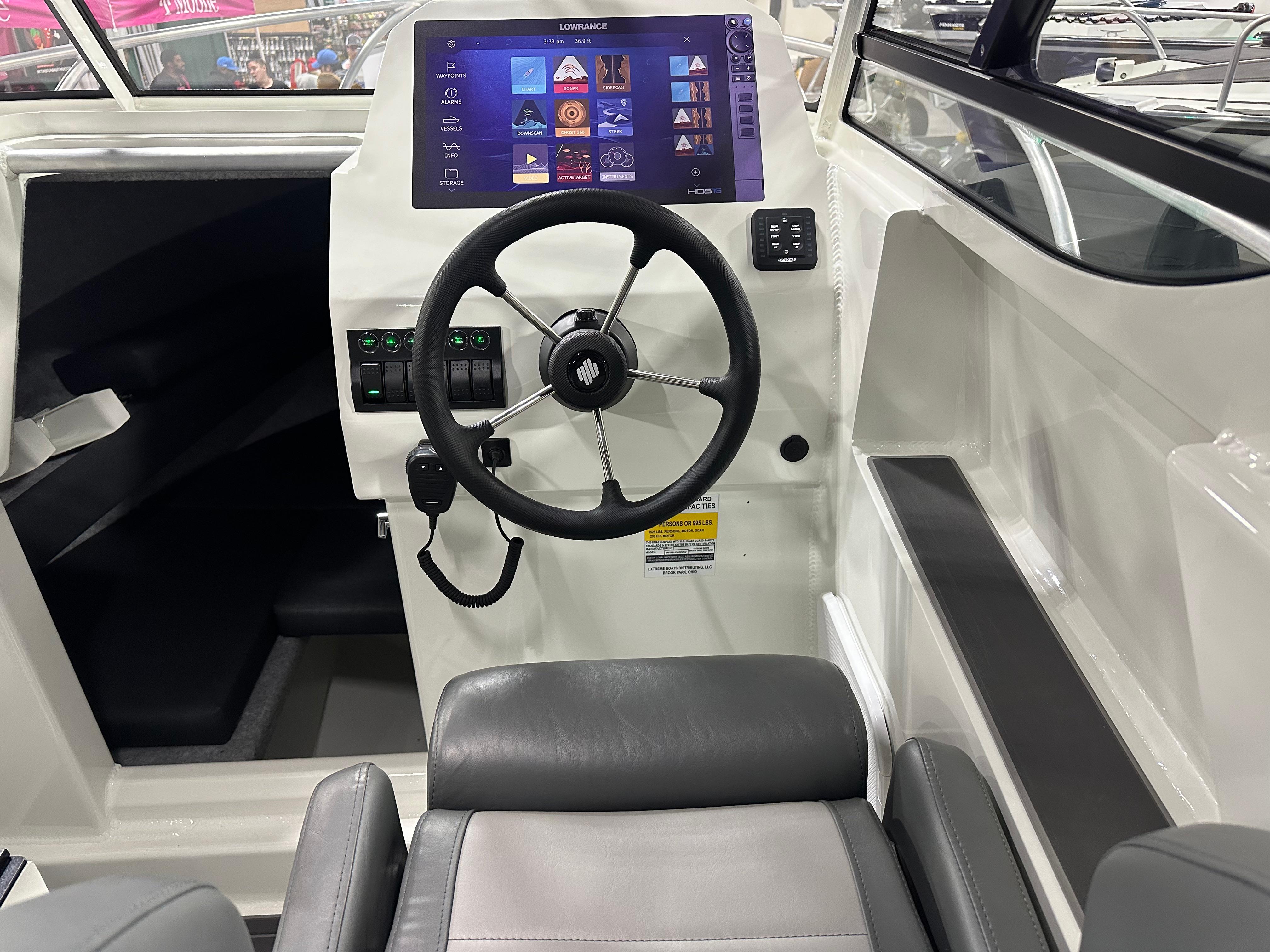 Steering Wheel, VHF Radio Mike, Lowrance Display 