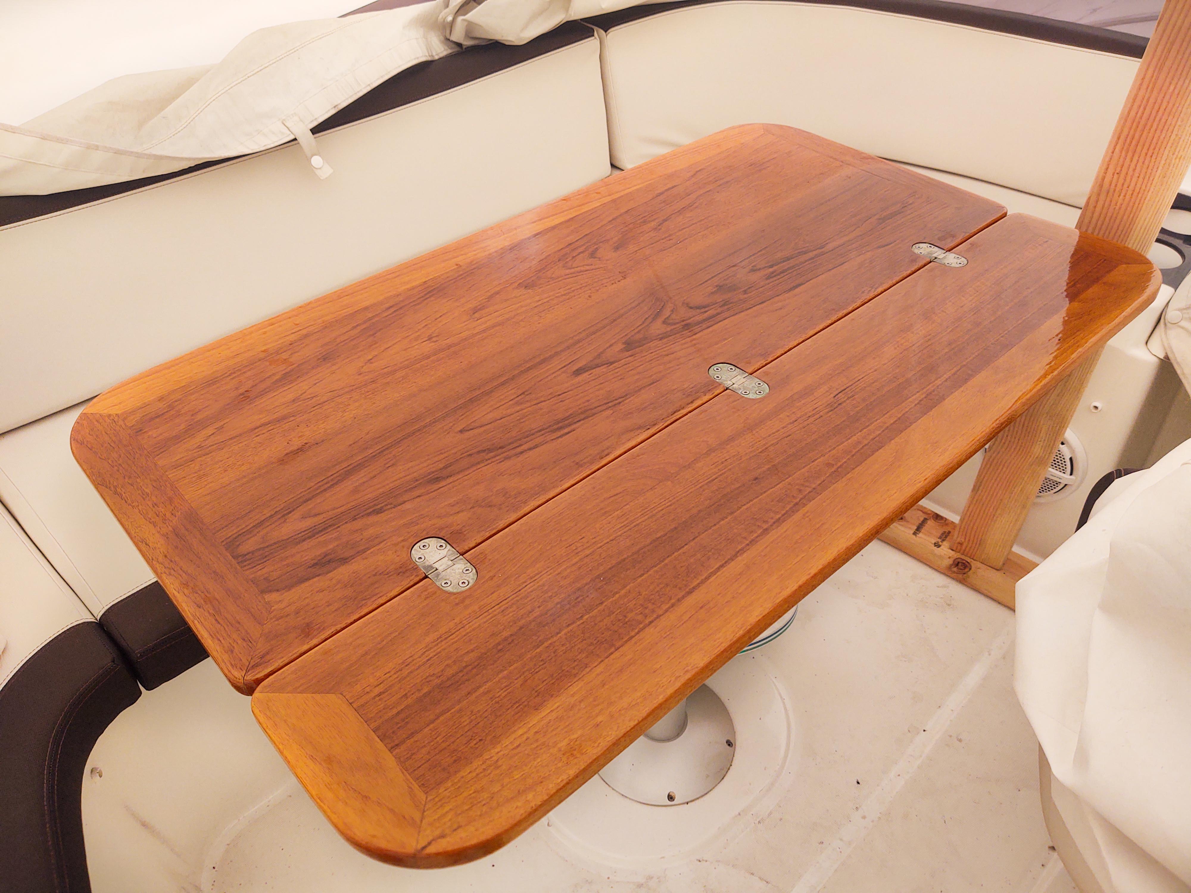 Flybridge table with leaf extended