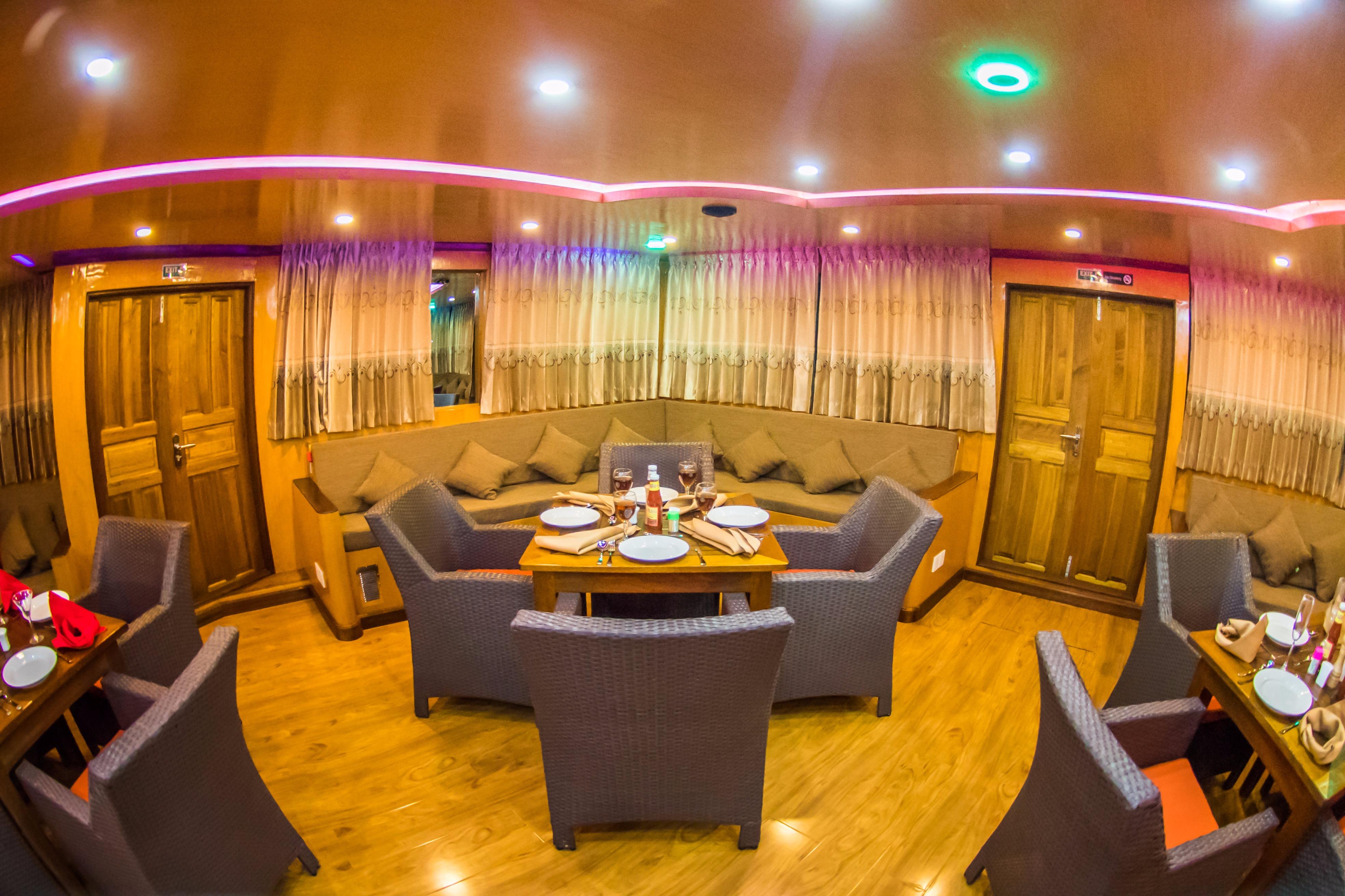 Custom 110 Motor Yacht Dining and Lounge Area
