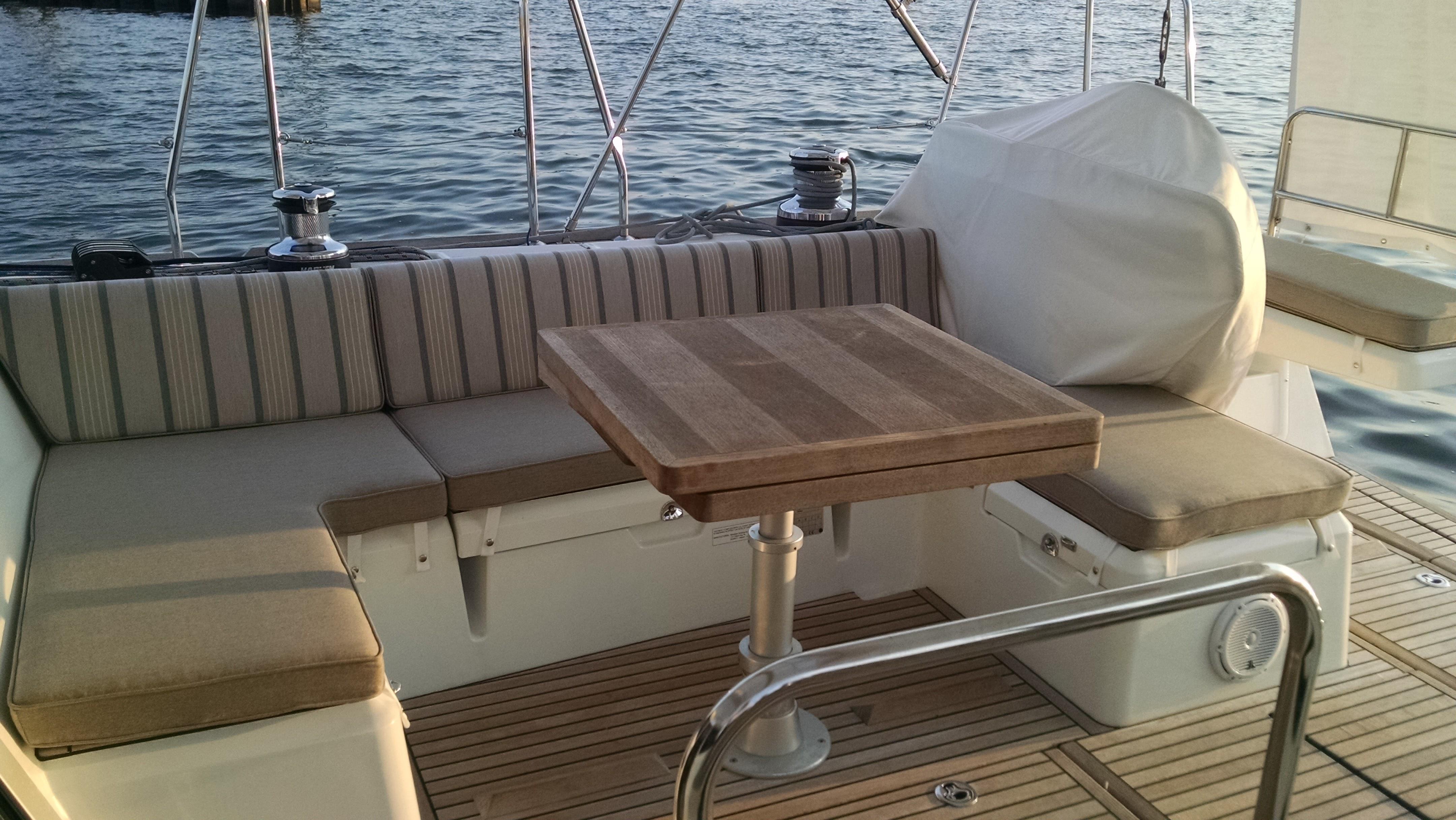 Starboard cockpit cushions and adjustable table