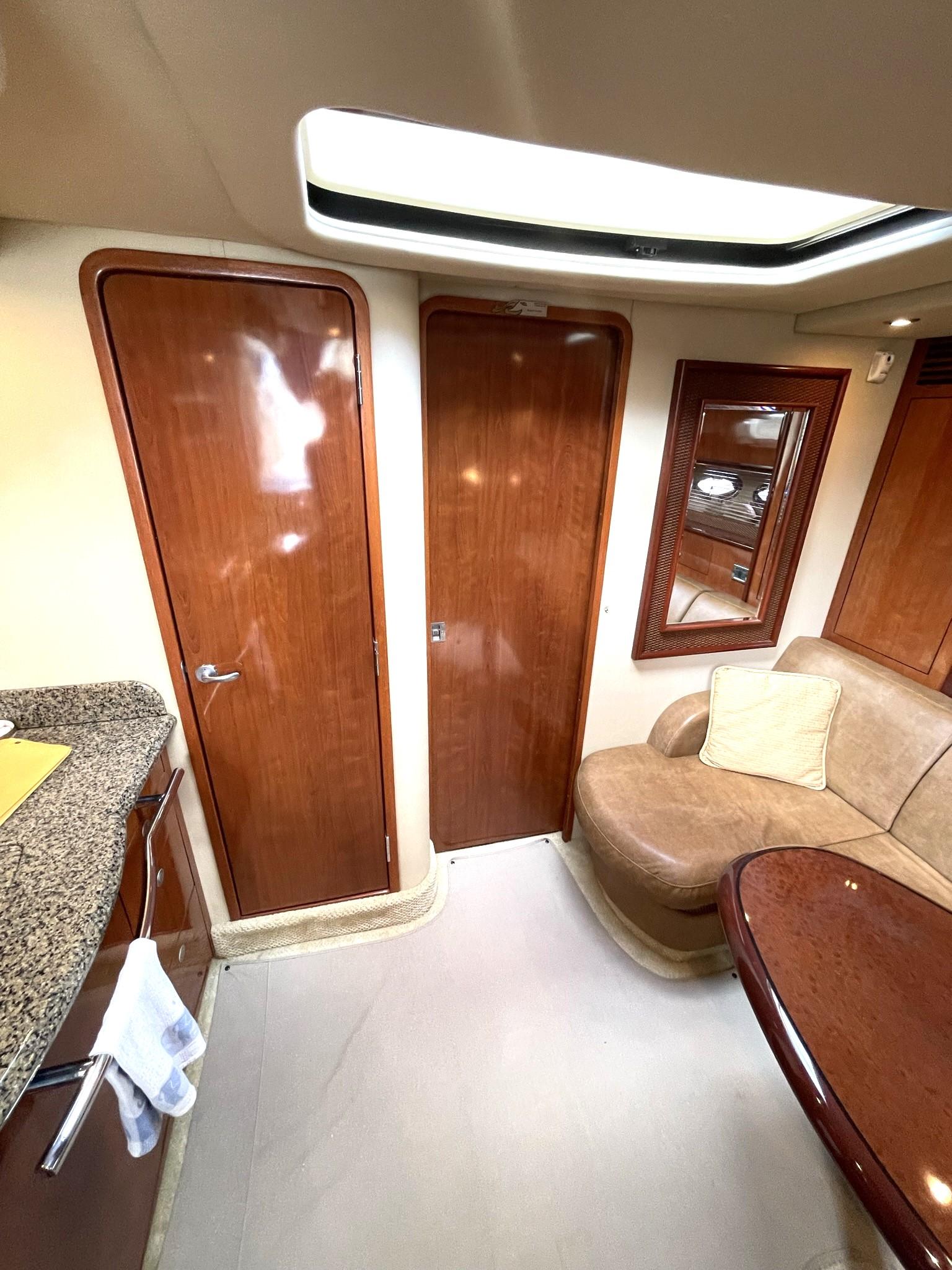 MASTER STATEROOM BULKHEAD W/HARD DOOR TO PRIVATE MASTER STATEROOM & DAY HEAD ENTRANCE