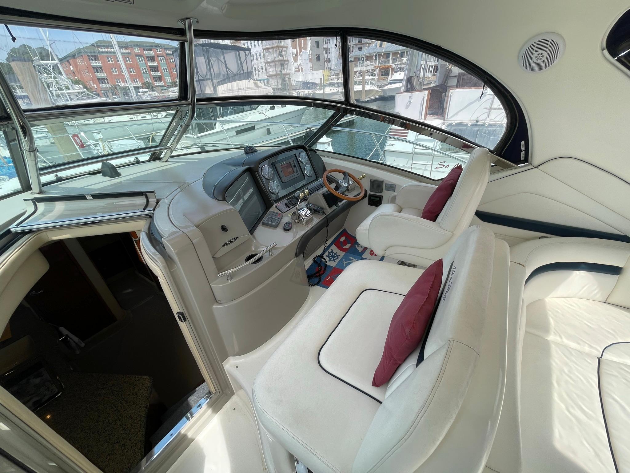 HELM DECK OVERVIEW W/ADJUSTABLE CAPTAINS CHAIR & DOUBLE BENCH COMPANION SEATING