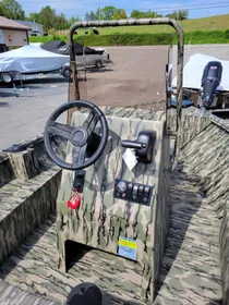 2024 Smoker Craft Freedom 180 CC center console, Camo. (In stock!)