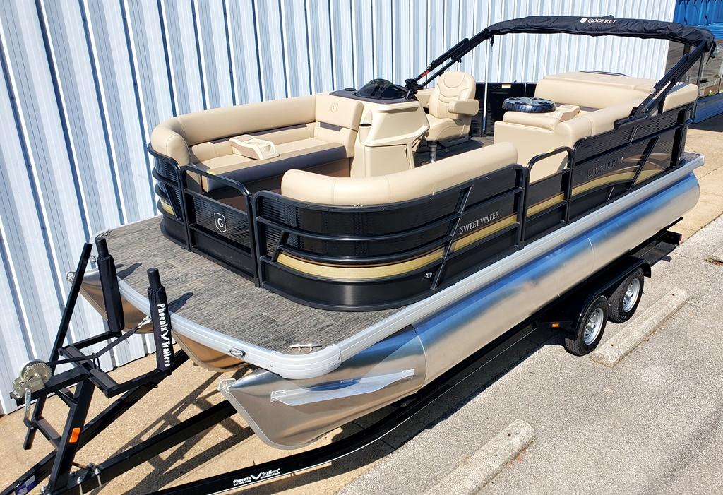 Powered bimini top in trailering position
