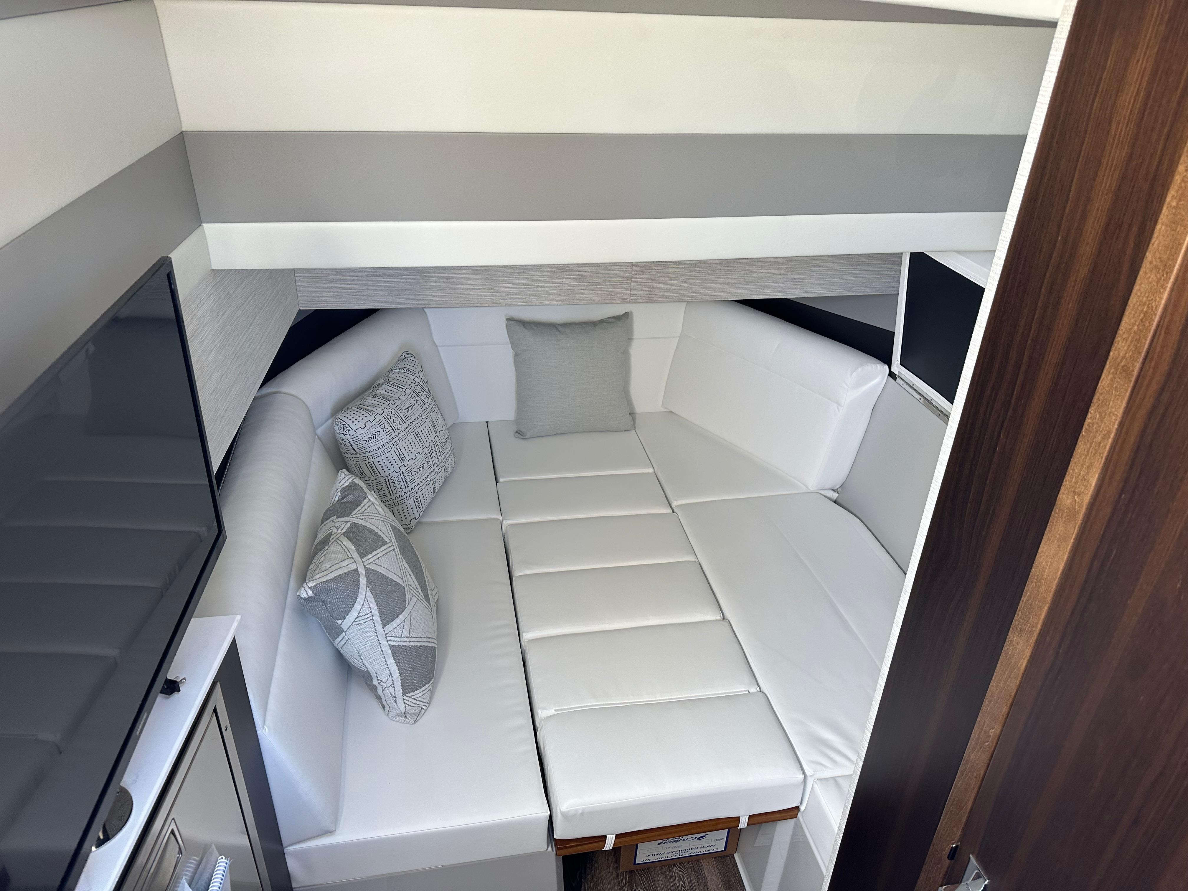 V Berth converted to sleeper table under cushions
