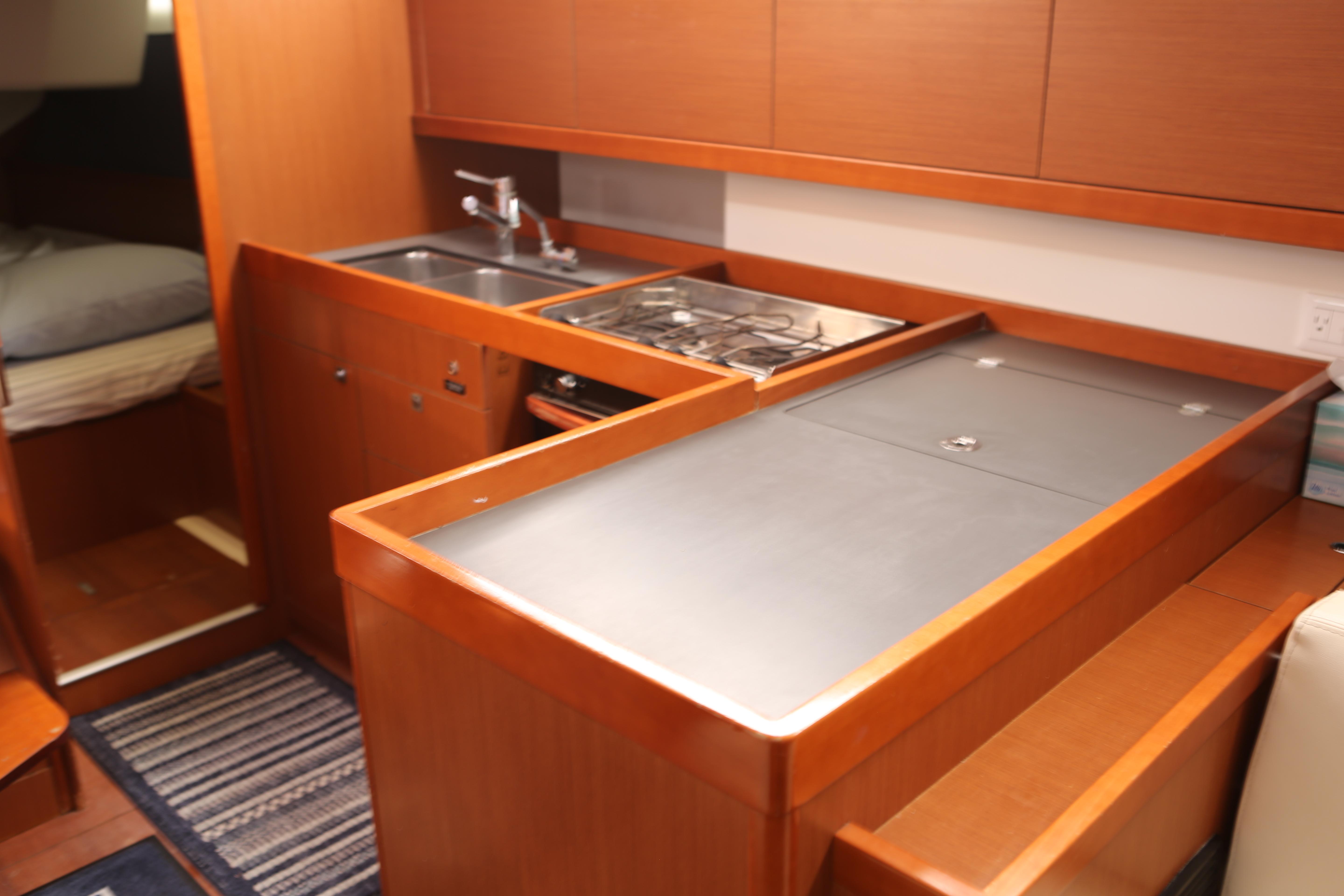 L-shaped galley to port