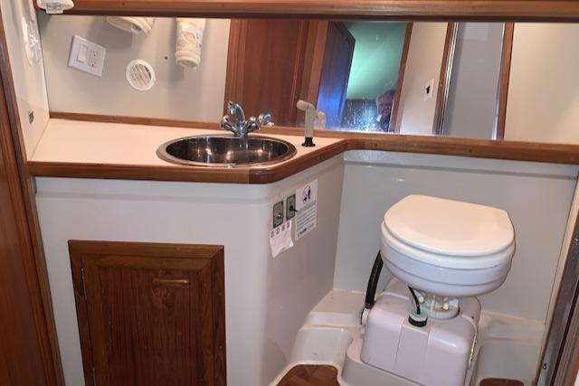 Forward Head / Electric Toilet / Stainless Sink